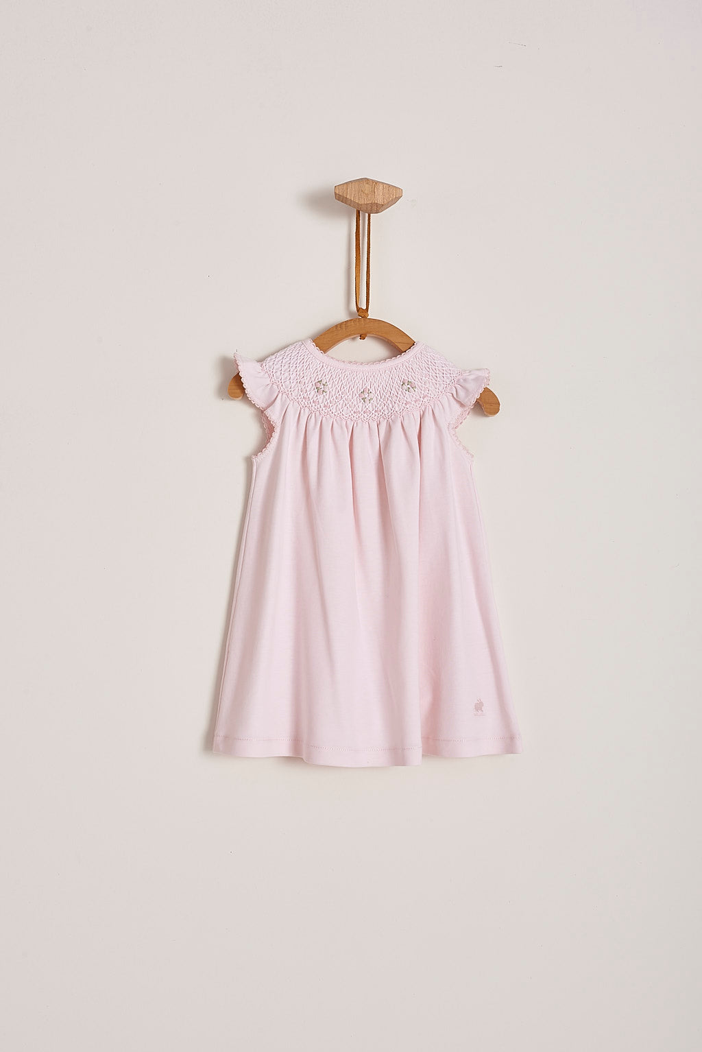 This is definitely the prettiest, effortless and softest 100% Pima Cotton dress for your little girl! The smock at the front makes it super stylish, a must-have for a baby girl spring-summer wardrobe. Comes with matching knickers to cover the nappy.  Makes an ideal gift! Colour: Pink Composition: 100% Peruvian Pima Cotton.  Made in Peru. Machine washable.