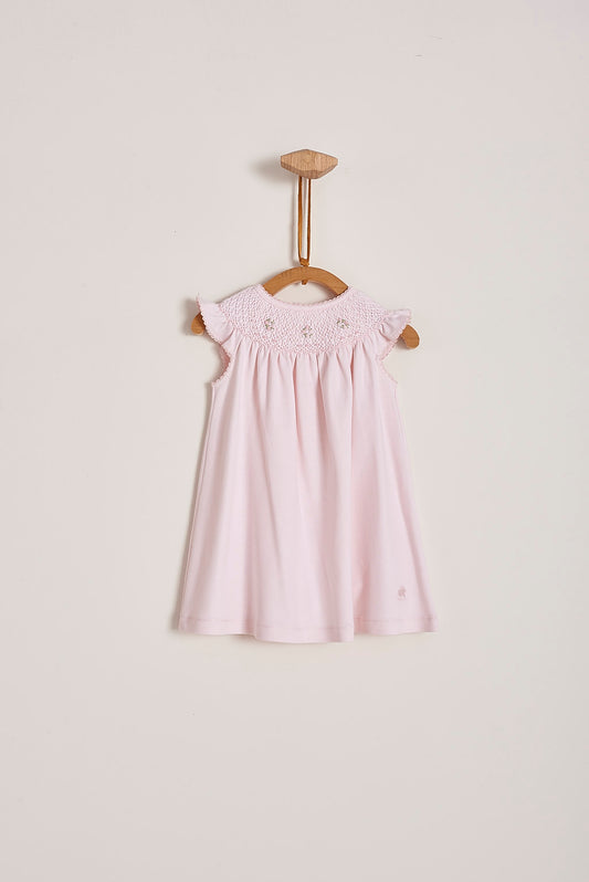 This is definitely the prettiest, effortless and softest 100% Pima Cotton dress for your little girl! The smock at the front makes it super stylish, a must-have for a baby girl spring-summer wardrobe. Comes with matching knickers to cover the nappy.  Makes an ideal gift! Colour: Pink Composition: 100% Peruvian Pima Cotton.  Made in Peru. Machine washable.